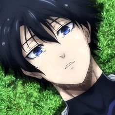 an anime character laying in the grass with blue eyes