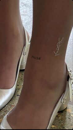 Ankle Tattoo Aesthetic, Ysl Tattoo, Small Ankle Tattoo, Word Tattoo Ideas, Small Foot Tattoos, Word Tattoo, Cute Tiny Tattoos, Stylist Tattoos