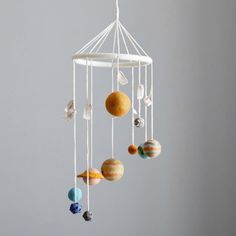 a mobile with planets hanging from it