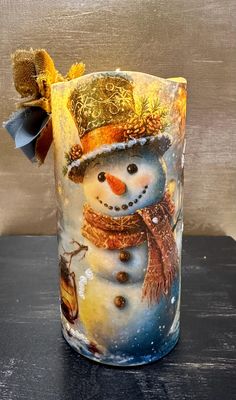 a frosty glass with a snowman on it