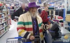 an old man in a purple hat is shopping