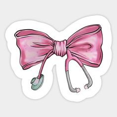 a pink bow with two handles attached to it