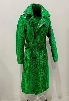 The EMERALD SNAKESKIN LEATHER COAT is one of the jewels of the outerwear collection. ⠀ A coat of laconic design with a unique texture of snakeskin and with a magical shade - truly ROYAL LUXURY. This model was created for women who know how to emphasize nobility and impeccable taste with their style. In a python skin coat your every look will be ARISTOCRATIC and, at the same time, trendy. ⠀ We believe our coat will become one of the favorite items in your wardrobe! Outside: Genuine python leather Luxury Leather Outerwear For Party, Luxury Leather Party Outerwear, Luxury Leather Outerwear With Crocodile Pattern, Luxury Crocodile Pattern Leather Jacket, Snakeskin Trench Coat, Luxury Winter Leather Jacket With Snake Print, Fall Snake Print Leather Jacket, Camp Fashion, Green Leather Jackets