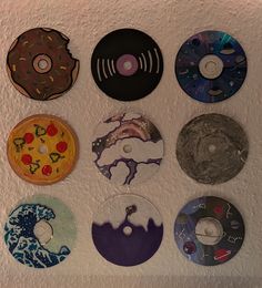 there are many different types of discs on the wall with each one's disc