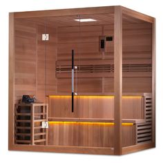 the inside of a wooden sauna with lights