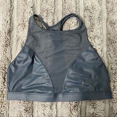 Brand New With Tags -High Neckline -True To Size -Color Is A Shiny Blue/Grey Victoria's Secret Stretch Workout Tops, Victoria's Secret Fitted Athleisure Activewear, Gray Mesh Activewear For Sports, Victoria's Secret Sporty Stretch Top, Victoria's Secret Stretch Activewear For Workout, Victoria's Secret Sporty Tops For Sports, Victoria's Secret Athleisure Workout Activewear, Gray Mesh Back Athleisure Activewear, Gray Mesh Back Activewear Athleisure