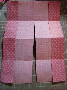 some pink and white squares on a cutting board