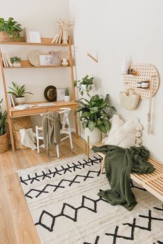 a room with a wooden bench, potted plants and bookshelf on the wall