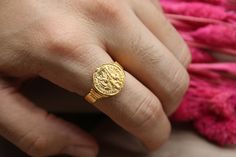 🏛️ Journey through History: Ancient Roman Coin 14K Unisex Ring 🏛️ Embrace the allure of the ancient world with this exquisite unisex ring. Crafted with an authentic ancient Roman coin and set in elegant 14K gold, this ring invites you to explore the rich stories of civilizations long past. ⚱️ Timeless Treasure: The genuine Roman coin at the heart of this ring carries the weight of centuries, connecting you to a time of emperors, myths, and the echoes of a bygone era. ✨ Unisex Elegance: Designed to be worn by all, this ring's elegance transcends gender. Its combination of ancient heritage and 14K gold craftsmanship speaks of a legacy that spans generations. 🎁 Thoughtful Gift: Give the gift of history and elegance to a loved one or yourself. This ring is more than just an accessory; it's Byzantine Yellow Gold Signet Ring For Anniversary, Byzantine Style Signet Ring For Anniversary, Yellow Gold Byzantine Signet Ring For Anniversary, 14k Gold Byzantine Style Rings, 14k Gold Byzantine Round Ring, 14k Gold Byzantine Style Round Rings, 14k Gold Byzantine Ring Gift, 14k Gold Byzantine Style Gift Rings, 14k Gold Byzantine Ring As Gift