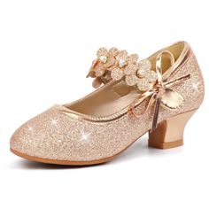 a pair of girls's gold glitter shoes with bows