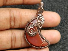 You will receive One Carnelian Moon Pendant Wire Wrapped copper pendant Gemstone Healing Jewelry Filigree Art Wire Wrap Pendant Necklace For Her Beautiful gift . Pendant Size: 43 mm long include bail. Many thanks for you visit my store ♥ if you have any question please contact us. For wholesale Price Please Convo me. You can order different items as many you like . Copper Jewelry With Moon Charm For Gift, Orange Copper Wire Jewelry As A Gift, Orange Copper Wire Jewelry For Gifts, Copper Moon Charm For Jewelry Making, Crescent Copper Jewelry As Gift, Crescent Copper Jewelry Gift, Crescent Copper Jewelry For Gift, Unique Crescent Shaped Copper Jewelry, Fire Jewelry