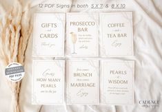 four different types of wedding cards on a bed with some dry grass next to them