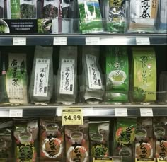 an assortment of teas on display in a store