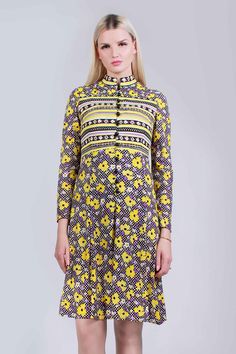 "1960s mod slinky Nylon long sleeve dress in a bold color combo of yellow, black, white, and purple Super cool trippy checkered floral print Lightweight and slippery micro ribbed Nylon, some stretch, not much Black rounded dome buttons and loops open the bodice to the waist Fitted bodice with darts A-line skirt that falls close to the body in layers and hits around the knee Unlined Union made in the USA Hand washed and ready to wear - no damage - excellent vintage in every way Be the bold babe y 1960s Mod, 60s Mod, Women Long Sleeve Dress, Wiggle Dress, Bold Color, Yellow Purple, Color Combo, Fitted Bodice, Purple Black