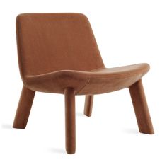 a brown leather chair sitting on top of a white floor next to a wooden leg