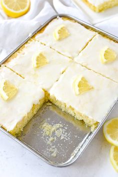 a pan filled with lemon cake on top of a table