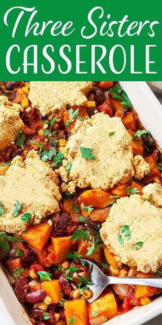 a casserole dish filled with sweet potatoes, beans and crumbled biscuits