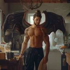 a shirtless man standing in a kitchen with wings on his head and hands behind his back