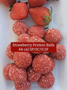 strawberry protein balls are displayed on a white surface with the words, strawberry protein balls 4 cal