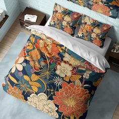 an image of a bedroom setting with flowers on the comforter and bed linens