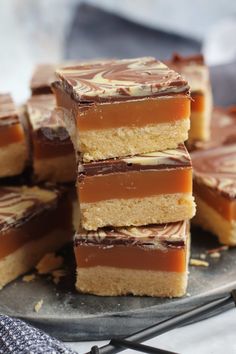 several pieces of cake sitting on top of a plate