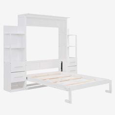 the bed frame is white and has no mattresses on it, but there's also a built - in bookcase for storage