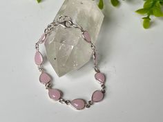 🌹Teardrop Shaped Pink Stone Gemstone  Bracelet  A beautiful piece of jewellery made of 925 sterling silver teardrop-shaped Rose Quartz gemstones. The length of the bracelet is adjustable, up to 8.25 inches, and matching earrings are also available. This listing is for 1 rose Quartz Bracelet.  🌟ROSE QUARTZ Healing Properties: Rose Quartz is known for promoting love, compassion, and kindness. This beautiful gemstone carries a soft feminine energy and helps to raise self-esteem.  cleanses the hea Quartz Healing Properties, Soft Feminine Energy, Rose Quartz Healing, Rose Quartz Jewelry, Quartz Gemstones, Stone Jewellery, Rose Quartz Bracelet, 1 Rose, Quartz Jewelry