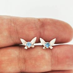 For important information, such as material information about my jewellery, my processing time, delivery information, and my return policy, please read my FAQ section. It's a lot, but it's very important. And if you need clarification, please ask. Are you a fan of Legend of Zelda and have been looking for Navi earrings but have metal sensitivities? Want a pair of gold stud earrings you can wear every day without worry about metal allergies?  Then these handmade solid gold Legend of Zelda Navi ge Legend Of Zelda Navi, Navi Fairy, Zelda Earrings, Zelda Navi, Zelda Jewelry, Game Earrings, Jewelry Video, Fairy Earrings, Ocarina Of Time