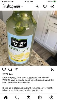 a bottle of lemonade sitting on top of a counter