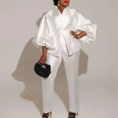 This Elegant White African Matching Set for Women is a chic and versatile outfit perfect for both evening parties and casual summer occasions. Combining the timeless elegance of classic white with the modern flair of African-inspired fashion, this two-piece set embodies sophistication and comfort. Designed for the stylish woman who appreciates contemporary Nigerian style, this outfit is ideal for making a statement at any event. Design Overview Set Composition: The matching set includes two piec Pencil Skirt Fall, Plus Size Two Piece, Nigerian Styles, Chunky Earrings, African Inspired Fashion, High Waisted Pencil Skirt, Tailored Shorts, Stylish Sandals, Versatile Outfits