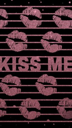 the words kiss me are written in gold and black