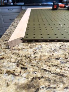 a kitchen counter top with holes in it