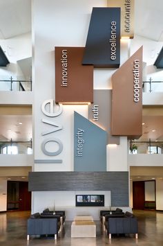 the lobby is clean and ready to be used for business or office use, as well as several different types of signage