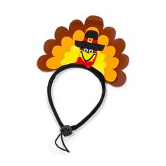 a turkey headband with a top hat on it's head and a black string