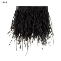 a black skirt with long fringes on the bottom and side, in front of a white background