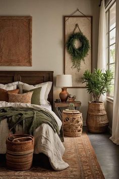 a bedroom with a large bed and two planters