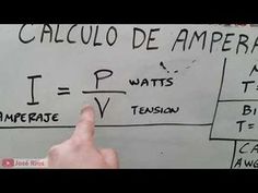 a hand pointing at a whiteboard with writing on it that says calculo de ampera