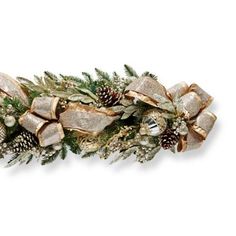 a christmas garland with pine cones and bells on it's side, decorated with gold bows