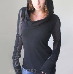 "Hooded top with really long scrunch-able sleeves. Oversized, cowl style hood. Black with Cement Grey color block. Comfortable, soft cotton spandex jersey. Top length is 26.5\"-27.5\" from shoulder to hem. See size chart below. Handmade to order. Please check the shop announcement for my current turnaround time- http://www.etsy.com/shop/joclothing?ref=si_shop Available in sizes X-Small,Small,Medium, Large, X-Large, XX-Large. (please indicate the size you would like or provide your measurements i Hooded Tops With Thumbholes For Winter, Hooded Winter Top With Thumbholes, Hooded Tops With Thumbholes For Fall, Fitted Hooded Top For Layering, Black Hooded Patchwork Top, Black Hooded Top With Patchwork, Black Patchwork Hoodie Top, Winter Hoodie With Thumbholes, Hooded Fall Hoodie With Thumbholes