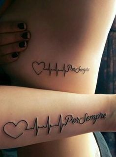 two people with tattoos on their arms that say persempre and heart beat