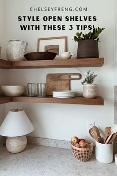 Decorate your open shelves Buffet Shelves Above, Kitchen Shelf Decoration, Open Shelve Decor Kitchen, How To Style Floating Shelves Dining Room, Wooden Floating Shelves In Kitchen, Wallpaper Behind Floating Shelves Kitchen, Styling Open Bar Shelves, Floating Shelf Styling Kitchen, Style Kitchen Floating Shelves