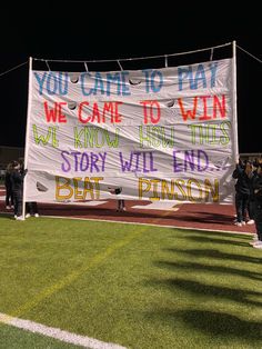 a banner that reads you came to eat we came to win we know ends story will end beat prison