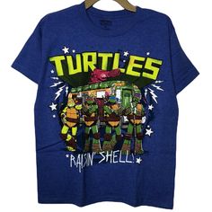 Classic Graphic Short Sleeves Tee Featuring The Teenage Mutant Ninja Turtles. Brand New Without Tags! No Flaws. Official Licensed Product. We Are A Smoke-Free And Pet-Free Home. J Blue Fan Apparel Tops With Character Print, Blue Tops With Character Print For Fans, Blue Character Print Fan Apparel Tops, Blue Character Print Tops For Fans, Blue Crew Neck Top With Pop Culture Style, Blue Crew Neck Tops In Pop Culture Style, Blue Crew Neck Top In Pop Culture Style, Unisex Blue Graphic Print Top, Unisex Blue Top With Graphic Print