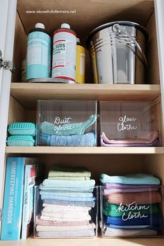 an open cabinet filled with lots of cleaning supplies and containers on top of each other