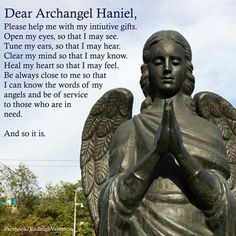 a statue with an angel holding his hands in front of the words dear archangel hancii