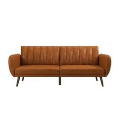 a brown leather couch with wooden legs