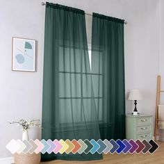 the curtains in this room are green and have different color options for each window curtain