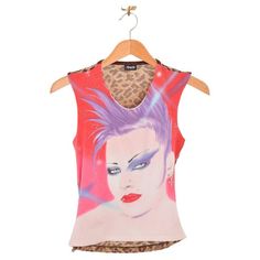 DOLCE & GABBANA PUNK FACE VEST 2000's 2000's Dolce & Gabbana vest top with garish punk face on the front, leopard print mesh reverse & safety pin side detail. Features; Stretchy cotton fit Sleeveless Safety pin side detail Front; 45% Cotton / 39% Nylon / 9% Spandex / 7% Lyrca Back; 63% Cupro / 37% Polyester Sizing; Pit to Pit; 16'' - 18'' Nape to Hem; 21'' Condition; Condition 10/10 Fitted Sleeveless Y2k T-shirt, Y2k Pink Graphic Print Tank Top, Edgy Streetwear Vest Top, Punk Streetwear Vest Top, 90s Fitted Vest Top, Fitted 90s Style Vest Top, Y2k Tank Top For Spring Alternative Fashion, Spring Y2k Tank Top For Alternative Fashion, Y2k Style Tank Top For Spring Alternative Fashion