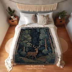 a bed with a deer tapestry on it