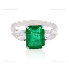 "A perfect blend of classy and elegant design Ring featuring 18k White Gold with Zambian Emerald. This is must to provide you an eye-catching attention. ✧✧Welcome To Our Shop Spectrum Jewels India✧✧ \"\"18k White Gold Natural Brilliant Cut Zambian Emerald Diamond Ring, Beautiful Bridal Statement Halloween Gift Ring, Anniversary Gift For Wife\"\" ★PRODUCT SPECIFICATION★ * ITEM CODE - SER-2199D * METAL - 18k White Gold * 18k White Gold Weight : 2.76 gm  * GROSS WEIGHT - 3.39 gm Approx * MAKING - H Elegant Gia Certified Marquise Wedding Ring, Classic Marquise Emerald Ring, Classic Gemstone Rings In Diamond White, Classic Diamond White Gemstone Rings, Elegant Three-stone Emerald Diamond Ring, Elegant Green Sapphire Ring Gia Certified, Elegant Three Stone Emerald Diamond Ring, Classic Formal Marquise Emerald Ring, Classic Formal Emerald Marquise Ring